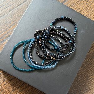 Stack of 8 stretchy bracelets. High quality beads.
